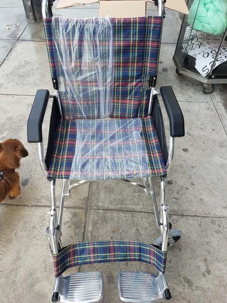 China Manufacturer Aluminum Transfer Manual Folding Wheelchair for Disabled