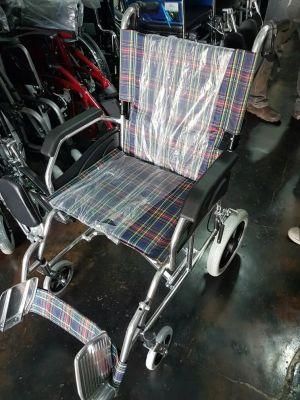 China Manufacturer Aluminum Transfer Manual Folding Wheelchair for Disabled